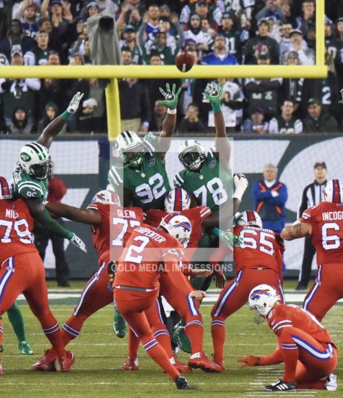 Buffalo Bills kicker DAN CARPENTER kicks the first of three field goals 47 yards in the second quarter against the New York Jets at MetLife Stadium. The Bills went on to win 22-17.