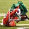 Buffalo Bills cornerback RONALD DARBY upends New York Jets running back CHRIS IVORY for no gain in the first quarter at MetLife Stadium. The Bills went on to uspset the Jets 22-17.