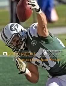New York Jets wide receiver ERIC DECKER slams ball to the ground after scoring a touchdown