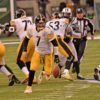 With approximately one minute left to play in the game and the Pittsburgh Steelers losing 20-13 and driving for a last minute touchdown to tie the game, a bad pass from Pittsburgh's center, MAURKICE POUNCEY sailed over the head of quarterback BEN ROELISBERGER