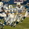 Indianapolis Colts quaterback, ANDREW LUCK, hands off to AHMAD BRADSHAW in the first quarter against the New York Giants. Bradshaw, who formerly played for the New York Giants, rushed for 50 yards and gained 29 yards on pass receptions leading the Colts to a 40-24 victory.