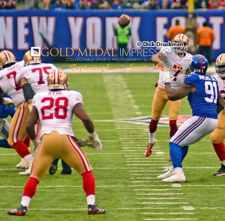 San Francisco 49ers quarterback, COLIN KAEPERNICK, throws pass to running back CARLOS HYDE, in the second quarter against the New York Giants. KAEPERNICK completed 15 of 29 attempts for 193yards and 1 touchdown leading the 49ERS to a 16-10 victory