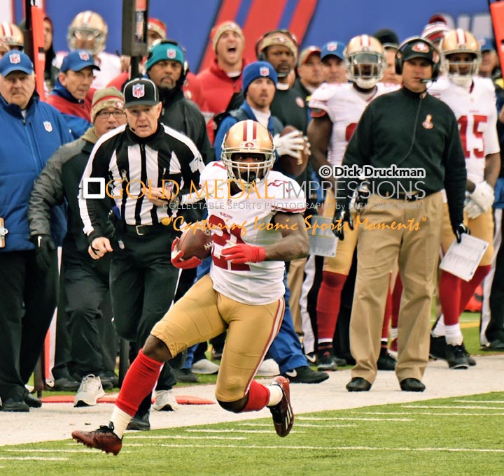 San Francisco 49ers running back, FRANK GORE, runs for a first down in the second quarter against the New York Giants. GORE ran for 95 yards on 19 carries leading the 49ers to a 16-10 victory.