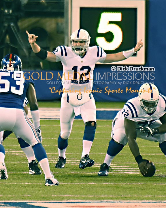 Indianapolis Colts quarterback, ANDREW LUCK, calls signals against the New York Giants in the first quarter at Metlife Stadium. LUCK completed 25 of 46 passes for 354 yards and 4 touchdowns leading the Colts to a 40-24 victory.