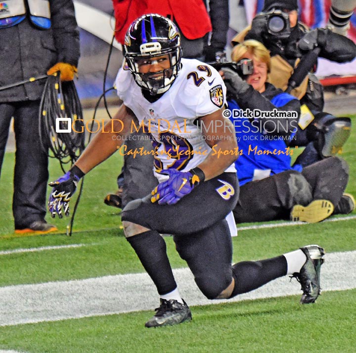 Baltimore Ravens running back, JUSTIN FORSETT, scores against the New England Patriots in the third quarter giving the Ravens a 28-14 lead. The Patriots rallied in the fourth quarter to win 35-31.