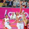 USA basketball star Diana Taurasi scores against Canada in the first quarter as defender L. Murphy attempts to block the shot. Taurasi scored 15 points leading the USA team to a 91-48 victory.(AP Photo/Dick Druckman)