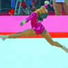 Gabby Douglas performs gracefully in the floor exercise of the women's individual all-around competion in the London Olympics. Douglas wins the gold medal.