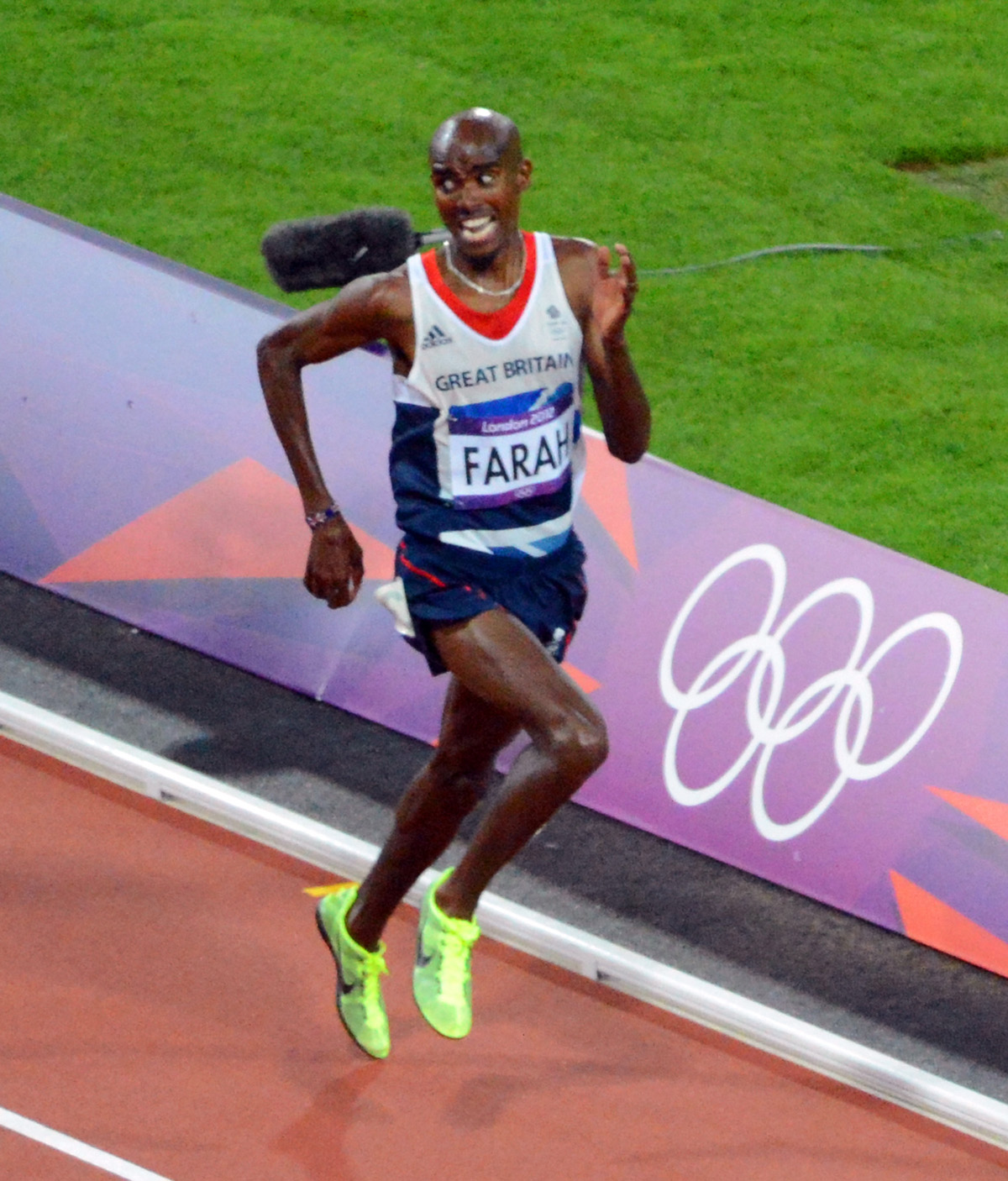 Great Briain runner, Mo Farah, wins the 10,000 meter gold medal in the London Olympics. Galen Rupp, from the USA won the Silver Medal.(AP Photo/Dick Druckman)