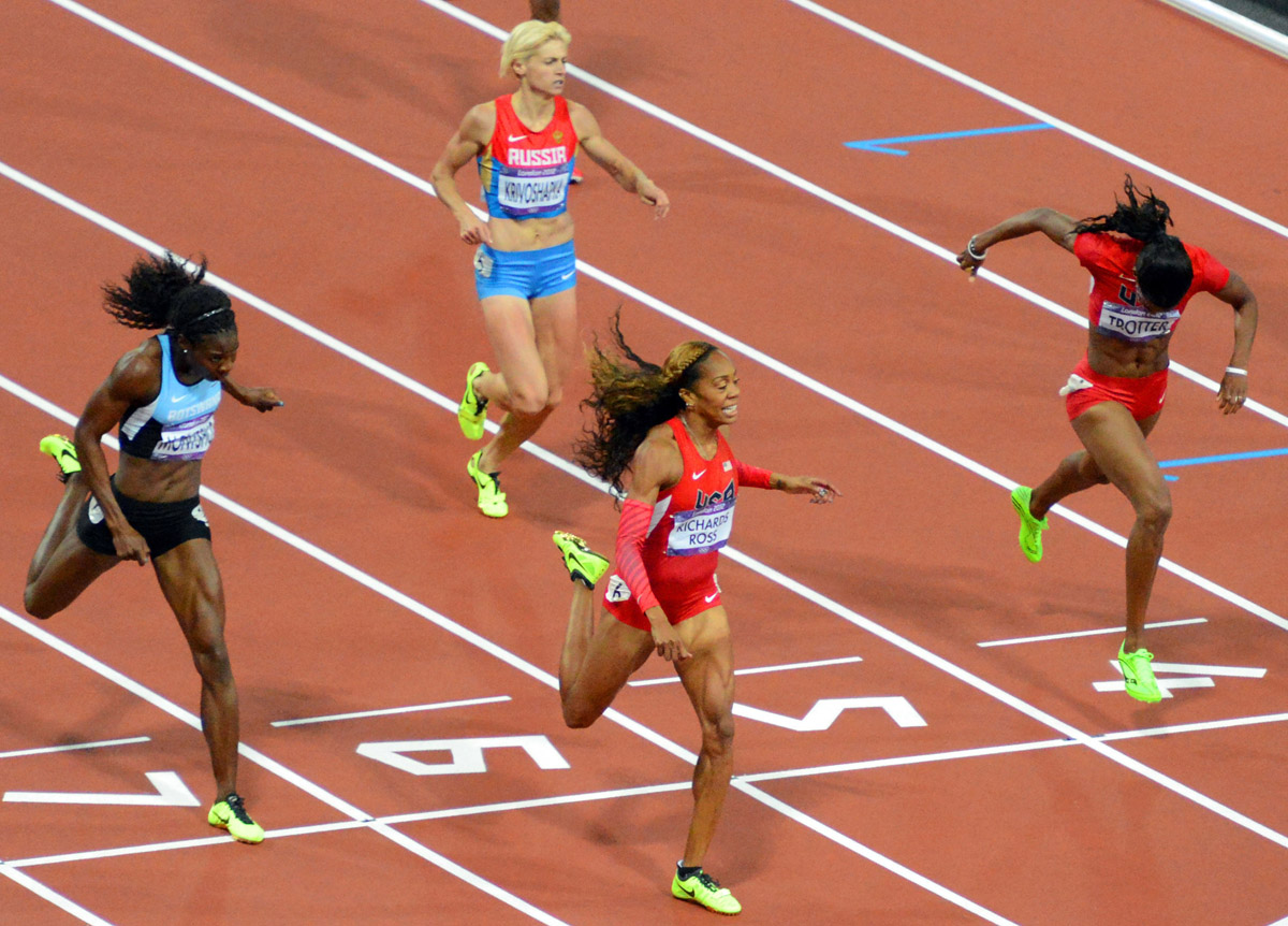 USA runner, Sanya Richards-Ross ,wins the women's 400Meter event. while her partner Trotter earns a bronze medal.