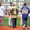 Boston Bruins legend Bobby Orr shakes hands with Derek Jeter as part of the farewell ceremony honoring Derek Jeter's final game of his career at Fenway Park. Derek ended his career going 1 for 2 getting his 3,465th hit and driving in a run as the Yankees defeated the Red Sox 9-5.