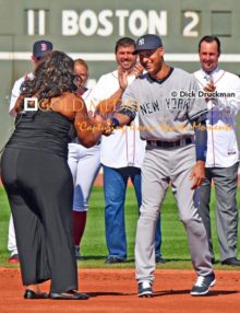 Springfield, Massachusetts recording star Michelle Brooks Thompson honors Derek Jeter at his farewell ceremony prior to his final game of his career. Derek ended his career by hitting his 3 465th hit driving in a run and leading the Yankees to a 9-5 victory.