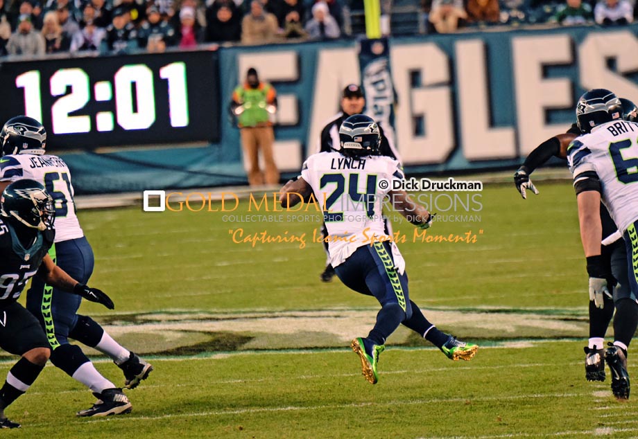 Seattle Seahawks running back, MARSHAWN LYNCH, runs through a gapping hole against the Philadelphia Eagles in the first quarter at Lincoln Financial Field. LYNCH ran for 86 yards leading the Seahawks to a 24-14 victory.
