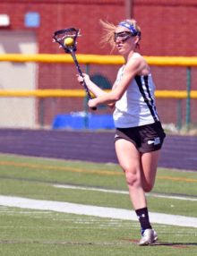 WWP NORTH SENIOR, AND OLDER SISTER OF CARLI HARPEL, SCORES THE FIRST OF THREE GOALS TO LEAD HER TEAM TO A 16-4 VICTORY OVER WWP SOUTH.