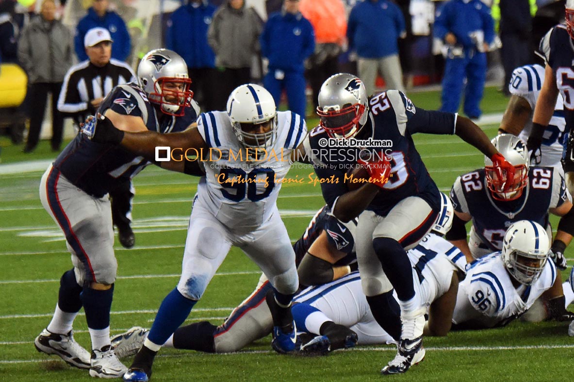 New England Patriots running back,LE GARRETTE BLOUNT, runs for a first down in the first quarter against the Indianapolis Colts in the AFC championship game at Foxboro, Massachusetts. BLOUNT ran for 148 yards on 30 carries scoring 3 touchdowns leading the Patriots to a 45-7 victory.