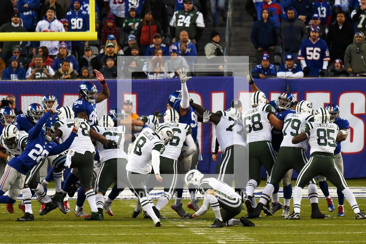 New York Jets kicker RANDY BULLOCK kicks a 31 yard field goal in overtime to defeat the New York Giants 23-20. New York Giants kicker Josh Brown missed a 48 yard field goal with 6:33 left in the extra session giving the Jets a victory.