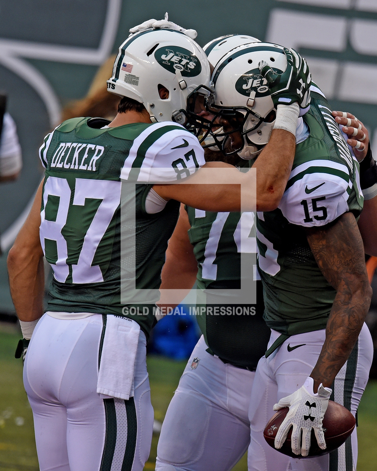 New York Jets wide receivers BRANDON MARSHALL and ERIC DECKER celebrate BRANDON MARSHALL S touchdown reception against the New England Patriots in the first quarter at MetLIFE stadiium giving the Jets a 10-3 lead. The Jets went on to win 26-20 in overtime.