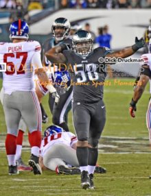 Philadelphia Eagles outside linebacker, TRENT COLE, celebrates sacking New York Giants quarterback, ELI MANNING, in the second quarter at Lincoln Financial Field. The Eagles sacked MANNING 8 times leading to a 27-0 victory.