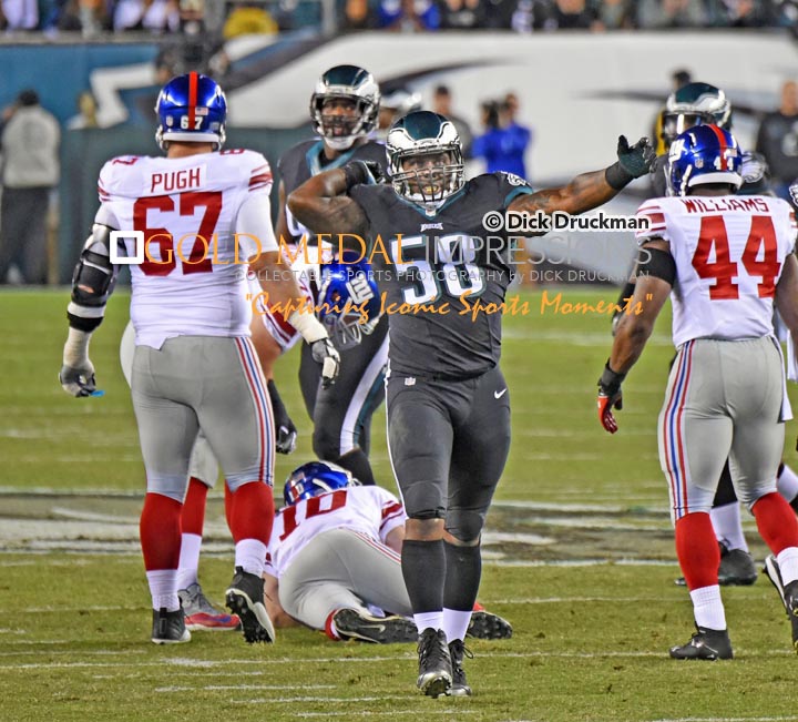 Philadelphia Eagles outside linebacker, TRENT COLE, celebrates sacking New York Giants quarterback, ELI MANNING, in the second quarter at Lincoln Financial Field. The Eagles sacked MANNING 8 times leading to a 27-0 victory.