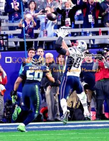 New England Patriots tight end, ROB GRONKOWSKI, catches a touchdown pass behind Seattle Seahawks linebacker KJ WRIGHT in the second quarter of Super Bowl XLIX. The Patriots went on to win 28-24.