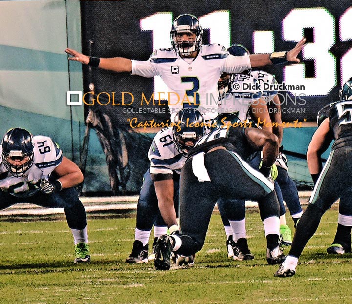 Seattle Seahawks quarterback, RUSSELL WILSON, calls signals against the Philadelphia Eagles in the first quarter at Lincoln Financial Field. WILSON, threw 2 touchdown passes, ran for another score, had 263 yards passing and ran for 48 yards leading the Seahawks to a 24-14 victory over the Eagles.
