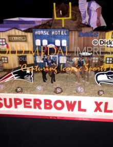 This SUPER BOWL XLIX CAKE was featured at one of the pregame parties-TASTE OF THE NFL . It was prepared by Buddy Valastros(The Cake Boss) --- a family owned business called Carlo's Bakery from Hoboken New Jersey.