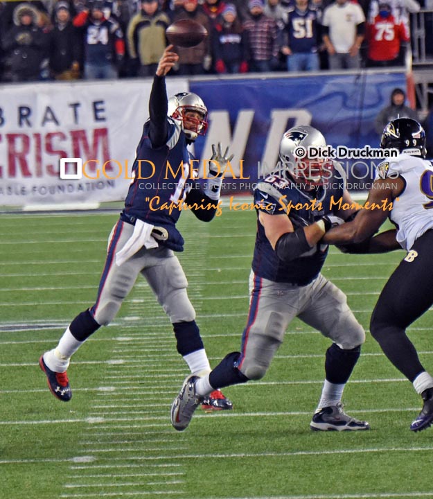 New England Patriots quarterback, TOM BRADY, completes pass in the fourth quarter of the NFC divisional playoff game against the Baltimore Ravens. The Patriots went on to win 35-31
