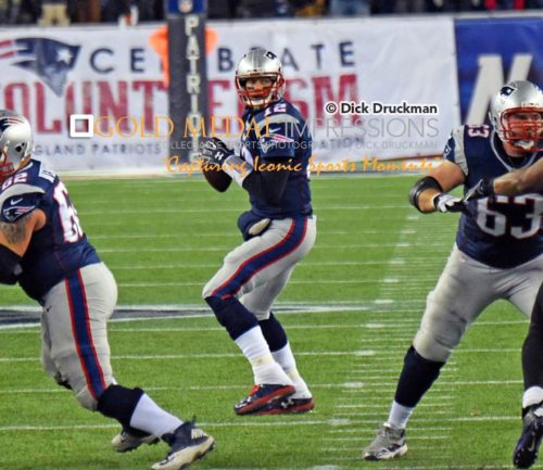 New England Patriots quarterback, TOM BRADY. looks downfield for his receiver in the fourth quarter of the NFC divisional playoffs against the Baltimore Ravens. The Patriots went on to win 35-31.