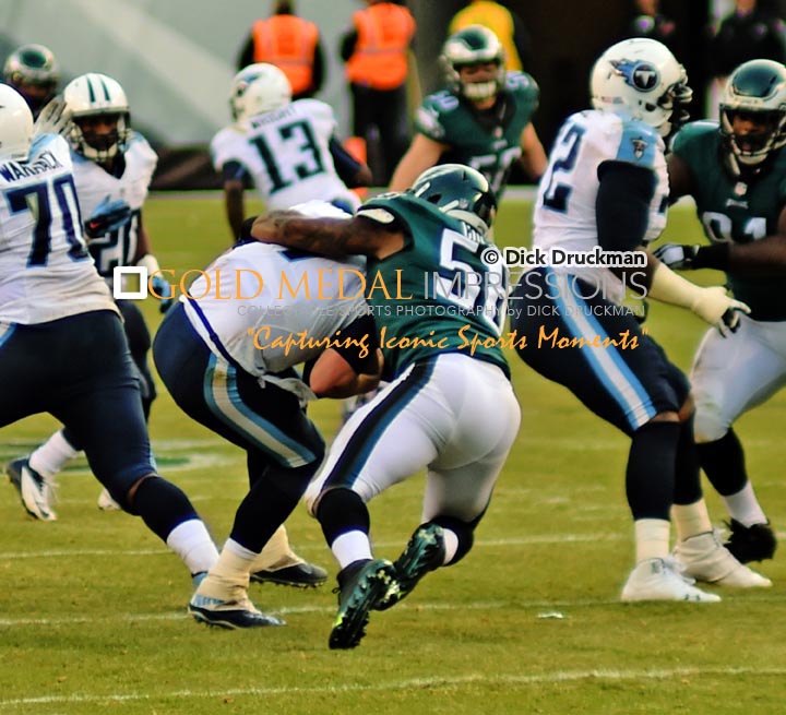 Philadelphia Eagles linebacker, TRENT COLE, sacks Tennessee Titans quarterback, ZACH METTENBERGER, in the third quarter at Lincoln Financial Field. COLE had 2 of the Eagles 5 sacks, leading the Eagles to a 43-24 victory.