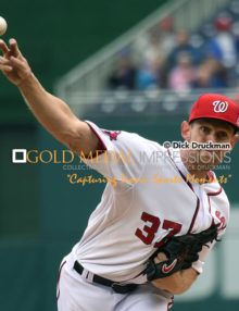 Washington Nationals starting pitcher, STEPHEN STRASBURG, throws his first pitch to New York Mets Curtis Granderson, at Nationals Park. STRASBURG completed 5 i/3 innings, giving up 9 hits, 4 earned runs, 1 bases on balls with 5 strike outs. The Nationals lost to the Mets 6-2.(AP Photo/Dick Druckman)