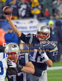 New England Patriots quarterback, TOM BRADY, completes pass in the first quarter against the Indianapolis Colts. Brady threw for 226 yards and 3 touchdowns leading the Patriots to a 45-7 victory and a trip to Super Bowl 49.