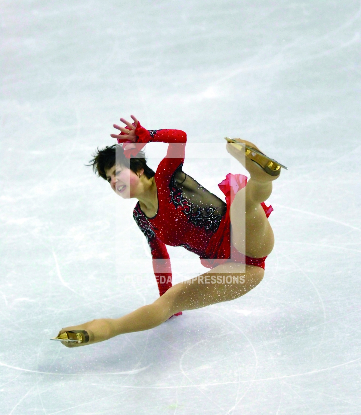 Russia Irina Slutskaya takes a disasterous fall in her attempt to win a gold medal in the women's ice skating final in Torino, Italy on February 23, 2006. Irina won the Bronze Medal.(AP Photo/Dick Druckman)