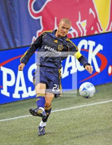 Los Angeles Galaxy super star David Beckham passes ball in the last minutes of the game against the New York Red Bulls at Giants Stadium. The score ended in a 2-2 tie.(AP Photo/Dick Druckman)