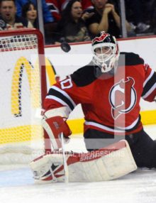 Martin Brodeur kept the Devils alive in the third period by blocking New York Rangers shot by Brad Richards. 40 year old Brodeur, blocked 33 shots on goal by the Rangers leading the Devils to a 3-2 overtime victory in game 6 of the Eastern Conference Finals to advance to their first Stanley Cup finals since 2003.(Dick Druckman)