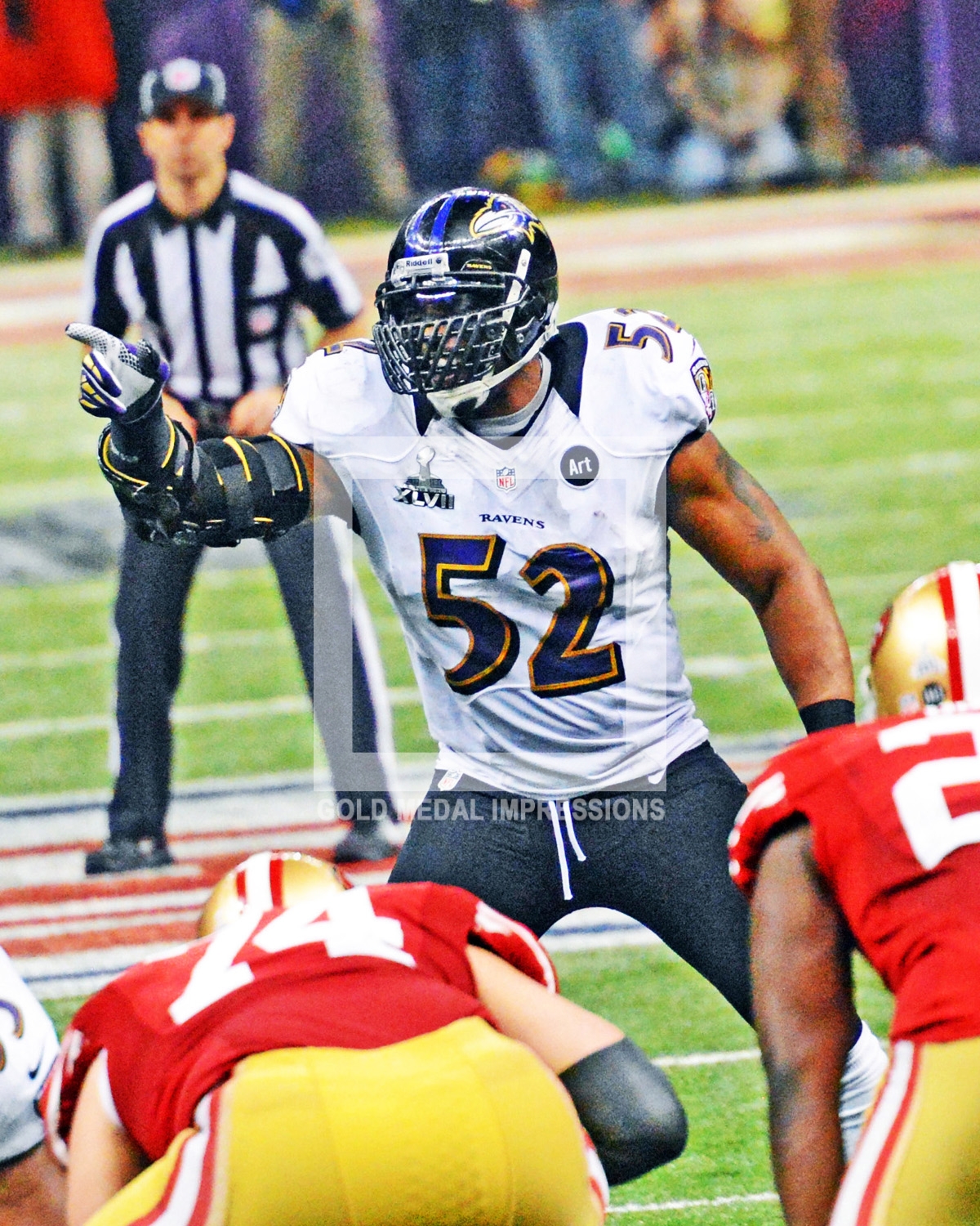 Baltimore Ravens leader, Ray Lewis, directs the Ravens defense in the fourth quarter against the San Francisoc 49ers in Super Bowl XLVII. The Baltimore Ravens