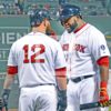 Boston Red Sox designated hitter, David Ortiz(Big Papi) pulls on Mike Napoli's beard as he makes a point in the eighth inning of game 6 if the World Series. Big Papi was selected as MVP of the Series as he went 11 for 16 for a 688 average