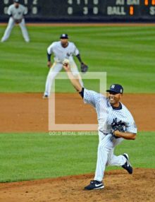 New York Yankees closer, Mariano Rivera, throws the last pitch of his career against Tampa Bay Rays pinch hitter Yunel Escobar in the top of the ninth inning at