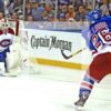 New York Rangers Martin st. Louis scores winning goal against Canadians rookie Dustin Tokarski in overtime giving the Rangers a 3-2 victory. The Rangers now head back to Montre'al leading 3-1 in round 3 of the Stanley Cup Playoffs.(AP Photo/Dick Druckman