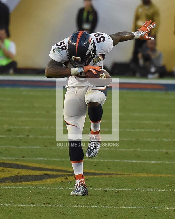 DENVER INSIDE LINEBACKER DANNY TREVATHAN TAKES A BOW AFTER RECOVERING A FUMBLE