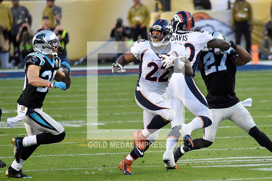Denver Bronco's running back CJ ANDERSON runs for a first down against the Carolina Panthers in SUPER BOWL 50. The Bronco's went on to win 24-10.