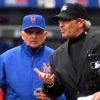 New York Mets manager, TERRY COLLINS, and Philadelphia Phillies manager, PETE MACKANIN, review the ground rules with chief umpire prior to the Mets Home Opener at CitiField. The Mets went on to win 7-2.