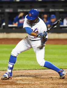 New York Mets outfielder, CURTIS GRANDERSON, singles in the 7th run of the inning off of relief pitcher Mike Broadway. The Mets went on to win 13-1.