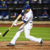 New York Mets second baseman, NEIL WALKER, doubles in the fourth run of the third inning off of starting pitcher Jake Peavy. The Mets went on to win 13-1.