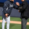 New York Yankees manager, JOE GIRARDI, argues with plate umpire, DANA DeMUTH, that Houston Astros shortstop should have been called out for running in fair territory on a dribbler to first base and a throwing error by the pitcher in the eighth inning. The tie breaking run scored and the safe call was upheld by the four umpires and Girardi played the remainder of the game under protest. The Houston Astros went on to win 5-3.