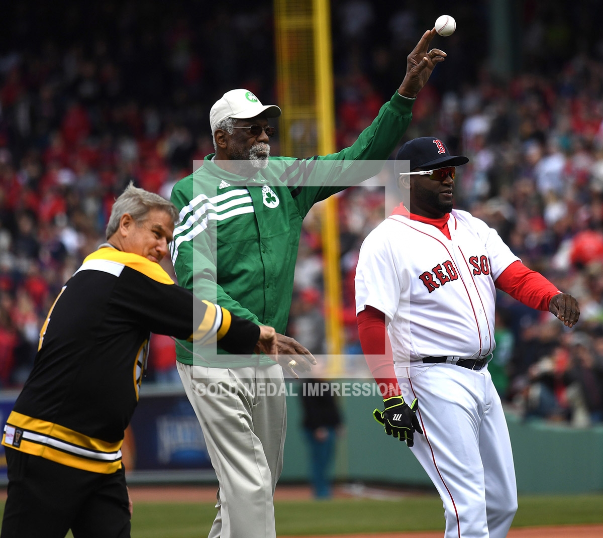 Three Boston Sport Icons, BOBBY ORR, BILL RUSSELL, and DAVID ORTIZ throw out the first ceremonial pitch at the Red Sox home opener at Fenway Park. Unfortunately, the Red Sox lost their opener 9-7 to the Baltimore Orioles who have started the season 6-0, the best start in their franchise history.