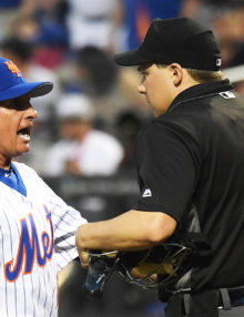 New York Mets manager, TERRY COLLINS, argues with home plate umpire