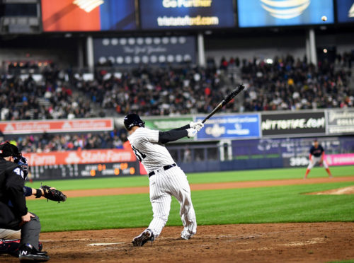 New York Yankees outfielder AARON HICKS hits a tiebreaking home run in the bottom of the 7th inning off of Boston Red Sox starter Rick Porcello. The Yankees went on to win 3-2.