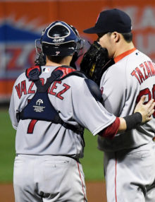 Boston Red Sox catcher CHRISTIAN VAZQUEZ talks with relief pitcher JUNICHI TAZAWA