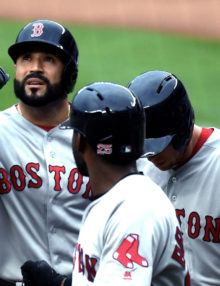 Boston Red Sox SANDY LEON celebrates hitting a home run