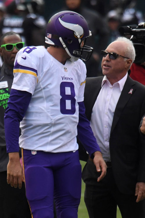 Eagles owner JEFF LURIE talks with former Eagle now Vikings QB SAM BRADFORD