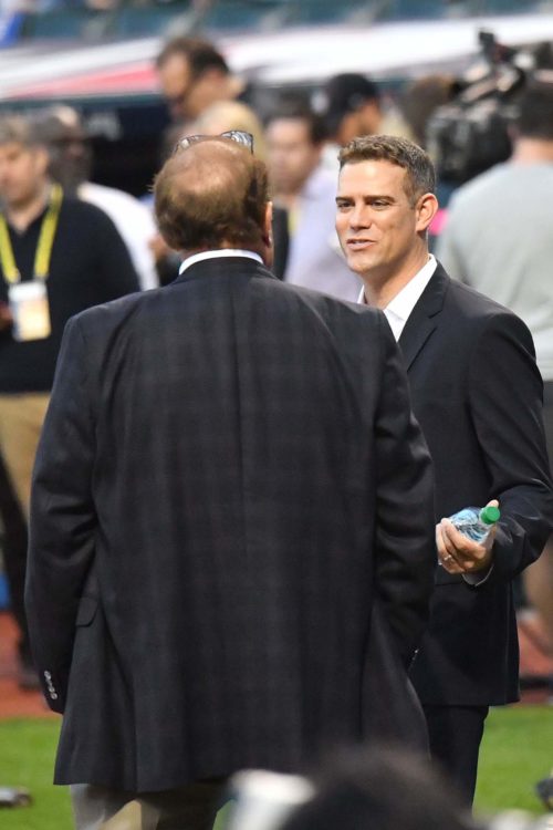 Chicago Cubs General Manager THEO EPSTEIN talks with sports announcer Chris Berman
